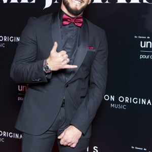 Rayane Bensetti au photocall de la soirée "Unis comme jamais" au profit de l'Unicef, au pavillon Cambon à Paris. Le 8 novembre 2021. © Pierre Perusseau / Bestimage 