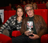 François Cluzet et sa femme Narjiss Slaoui-Falcoz durant la soirée de clôture et remise des prix de la 4eme édition du Nice Festival CinéRoman au cinéma Pathé Gare du Sud à Nice, le 9 octobre 2022.