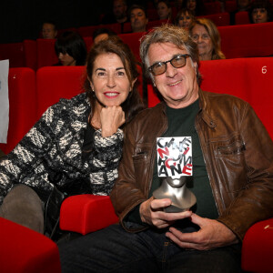 François Cluzet et sa femme Narjiss Slaoui-Falcoz durant la soirée de clôture et remise des prix de la 4eme édition du Nice Festival CinéRoman au cinéma Pathé Gare du Sud à Nice, le 9 octobre 2022.