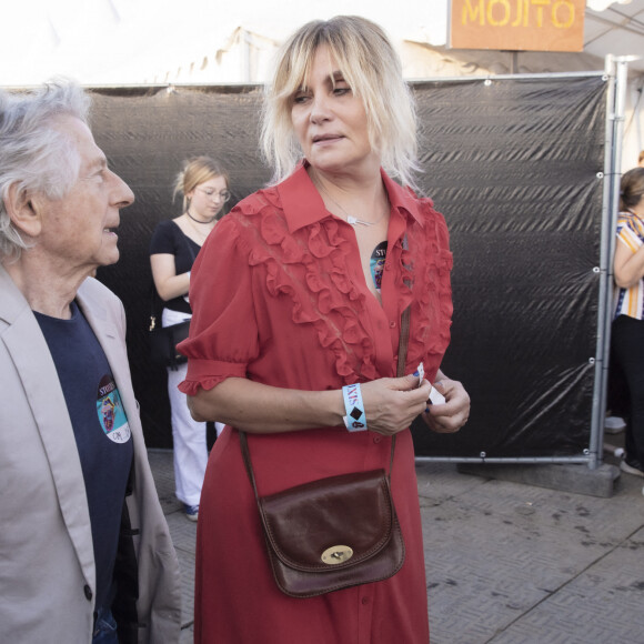 Roman Polanski et sa femme Emmanuelle Seigner - Les Rolling Stones en concert à l'hippodrome de Longchamp, dans le cadre de leur tournée anniversaire "Sixty", qui marque leurs 60 ans de carrière (1962-2022). Paris, le 23 juillet 2022. © Jack Tribeca / Bestimage.