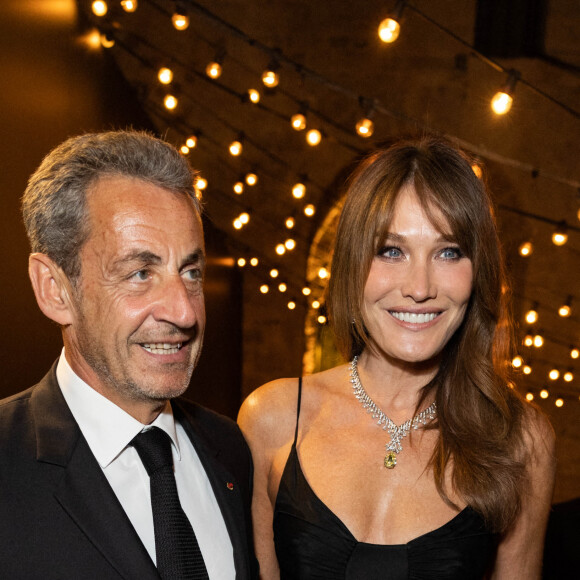 Carla Bruni et son mari Nicolas Sarkozy - Soirée "Women In Motion" par Kering au Château de la Castre lors du 7e Festival de Cannes. Le 22 mai 2022. © Olivier Borde / Bestimage.