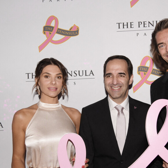 Vincent Pimont (directeur général du Peninsula Paris Hotel), Camille Lacourt et sa compagne Alice Detollenaere - Paris, le 29 septembre 2022 © Christophe Clovis-Rachid Bellak / Bestimage.