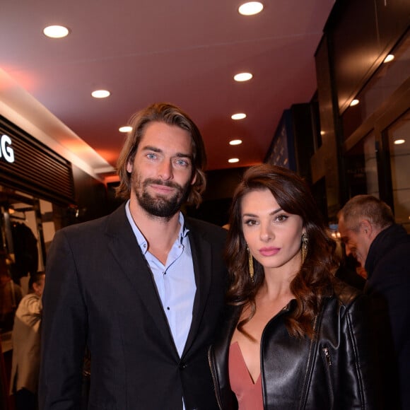 Camille Lacourt et sa compagne Alice Detollenaere (Miss Bourgogne 2010) lors de la soirée de réouverture de la boutique "Breitling", située rue de la Paix. Paris, le 3 octobre 2019. © Rachid Bellak/Bestimage.