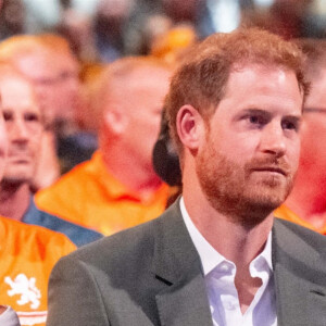 Le prince Harry et Meghan Markle lors de la cérémonie d'ouverture des Invictus Games 2020 à La Haye, le 16 avril 2022. 