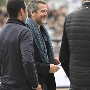 Guillaume Canet lors de la 8e édition du "Longines Paris Eiffel Jumping" au Champ de Mars à Paris, le 25 juin 2022.