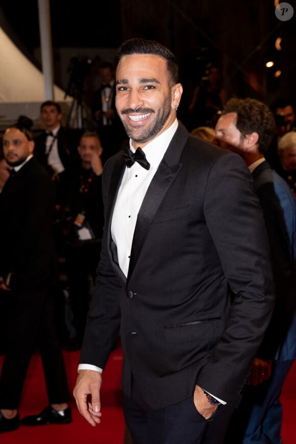 Adil Rami - Montée des marches du film "Novembre" lors du 75ème Festival International du Film de Cannes, le 22 mai 2022. © Cyril Moreau / Bestimage