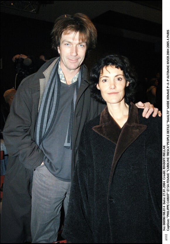 Philippe Caroit et sa femme Caroline Tresca au Défilé Smalto à Paris.