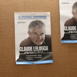 Exclusif - Affiches du spectacle - Cocktail - Spectacle symphonique Claude Lelouch "D'un film à l'autre" au Palais des Congrès de Paris le 14 novembre 2022. Pour Fêter ses 85 ans et 60 de carrière, Claude Lelouch a créé un ciné-concert, "Claude Lelouch - D'un film à l'autre", dans lequel la musique de ses films est jouée par l'orchestre philharmonique de Prague, au Palais des Congrès à Paris. Sur le gâteau, son chiffre fétiche : 13 car 85 ans (8+5 = 13). Claude Lelouch associe le 13 à toute sa vie professionnelle : sa société "Les films 13" et son cinéma, le "Club 13. © Moreau / Rindoff / Bestimage 