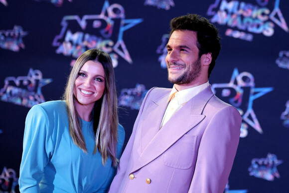 Amir et sa femme Lital au photocall de la 24ème édition des "NRJ Music Awards (NMA)" au Palais des Festivals à Cannes le 18 novembre 2022. © Dominique Jacovides / Bestimage 