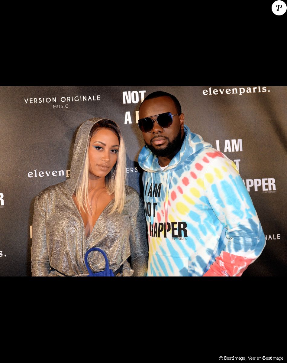 Info - Gims bientôt papa pour la cinquième fois? - Le rappeur Gims (Maître Gims - Gandhi Djuna) et sa femme Demdem Djuna lors de la soirée de lancement de la collection capsule "I'm not a rapper" de la marque Elevenparis (Eleven Paris) à Paris, France, le 11 avril 2019. © Veeren/Bestimage