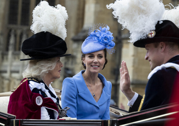 Le prince William, duc de Cambridge, et Catherine (Kate) Middleton, duchesse de Cambridge, le prince Charles, prince de Galles, et Camilla Parker Bowles, duchesse de Cornouailles, lors de la cérémonie de l'ordre de la Jarretière à la chapelle Saint-Georges du château de Windsor. Cette année pour la première fois Camilla Parker Bowles, duchesse de Cornouailles, a été investie comme nouveau chevalier de l'ordre de la Jarretière par la reine et a pu participer à la procession au côté du prince Charles. Londres, la 13 juin 2022.