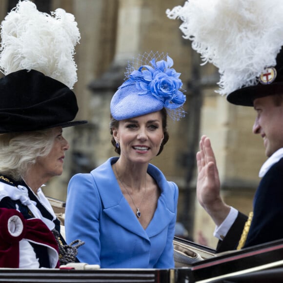 Le prince William, duc de Cambridge, et Catherine (Kate) Middleton, duchesse de Cambridge, le prince Charles, prince de Galles, et Camilla Parker Bowles, duchesse de Cornouailles, lors de la cérémonie de l'ordre de la Jarretière à la chapelle Saint-Georges du château de Windsor. Cette année pour la première fois Camilla Parker Bowles, duchesse de Cornouailles, a été investie comme nouveau chevalier de l'ordre de la Jarretière par la reine et a pu participer à la procession au côté du prince Charles. Londres, la 13 juin 2022.