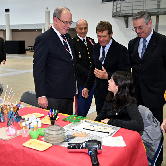 Exclusif - Le prince Albert II de Monaco, sa nièce, Camille Gottlieb, la marraine d'honneur du Téléthon monégasque, guidés par Muriel Agliardi, la présidente de l'association Monaco Maladies Génétiques, ont inauguré la 36ème édition du Téléthon au Grimaldi Forum à Monaco. Le 3 décembre 2022.  © Bruno Bebert / Bestimage 