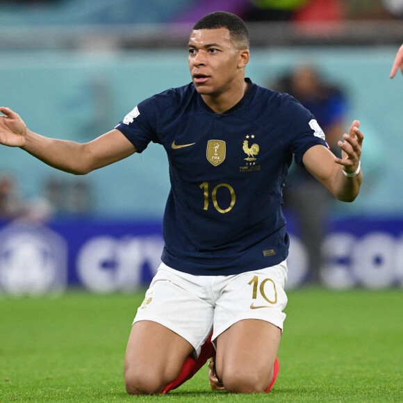 Kylian Mbappe - Joie des joueurs français lors du match des 1/8emes de finale de la Coupe de Monde de Football "France vs Pologne (3-1)" à Doha au Qatar. Le 4 décembre 2022 © Philippe Perusseau / Bestimage