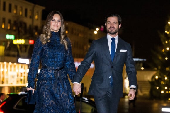 Le prince Carl Philip de Suède et la princesse Sofia assistent à un concert de Noël en l'église Gustaf Vasa à Stockholm le 21 décembre 2022. 