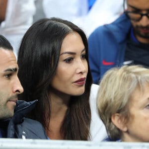 Adil Rami et sa compagne Sidonie Biémont enceinte lors du match du quart de finale de l'UEFA Euro 2016 France-Islande au Stade de France à Saint-Denis, France le 3 juillet 2016. © Cyril Moreau/Bestimage