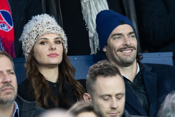 Camille Lacourt et sa compagne Alice Detollenaere (Miss Bourgogne 2010) dans les tribunes lors du match de championnat de Ligue 1 Conforama opposant le Paris Saint-Germain (PSG) aux Girondins de Bordeaux au Parc des Princes à Paris, France, le 23 février 2020. © Cyril Moreau/Bestimage 