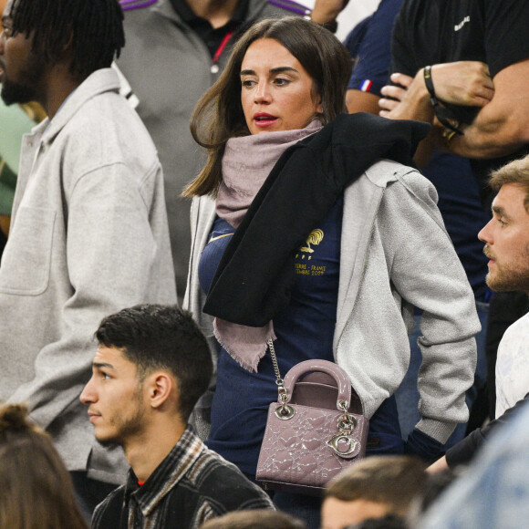 Erika Choperena - People et joueurs en famille dans les tribunes lors du match de demi-finale "France - Maroc" lors de la Coupe du Monde 2022 au Qatar (FIFA World Cup Qatar 2022). © JB Autissier / Panoramic / Bestimage