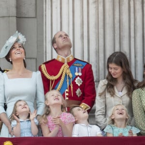 Le prince Charles, prince de Galles, le prince Harry, duc de Sussex, Meghan Markle, duchesse de Sussex, le prince William, duc de Cambridge, Catherine (Kate) Middleton, duchesse de Cambridge, la princesse Charlotte de Cambridge, le prince George de Cambridge, Savannah Phillips, Isla Phillips, Eloïse Taylor et Estella Taylor - Les membres de la famille royale britannique lors du rassemblement militaire "Trooping the Colour" (le "salut aux couleurs"), célébrant l'anniversaire officiel du souverain britannique. Cette parade a lieu à Horse Guards Parade, chaque année au cours du deuxième samedi du mois de juin. Londres, le 9 juin 2018. 