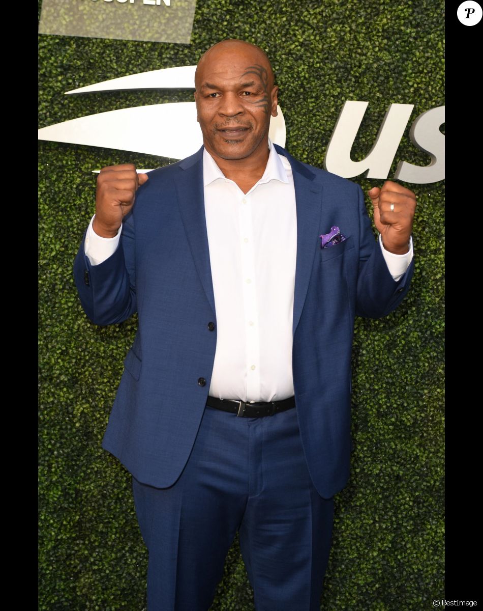 Info - Mike Tyson visé par une nouvelle plainte pour viol - Info - Mike Tyson remonte sur le ring à 54 ans pour un combat exhibition - Mike Tyson arrive à l'US Open de tennis au USTA National Tennis Center à New York City, New York, Etats-Unis, le 27 août 2018.
