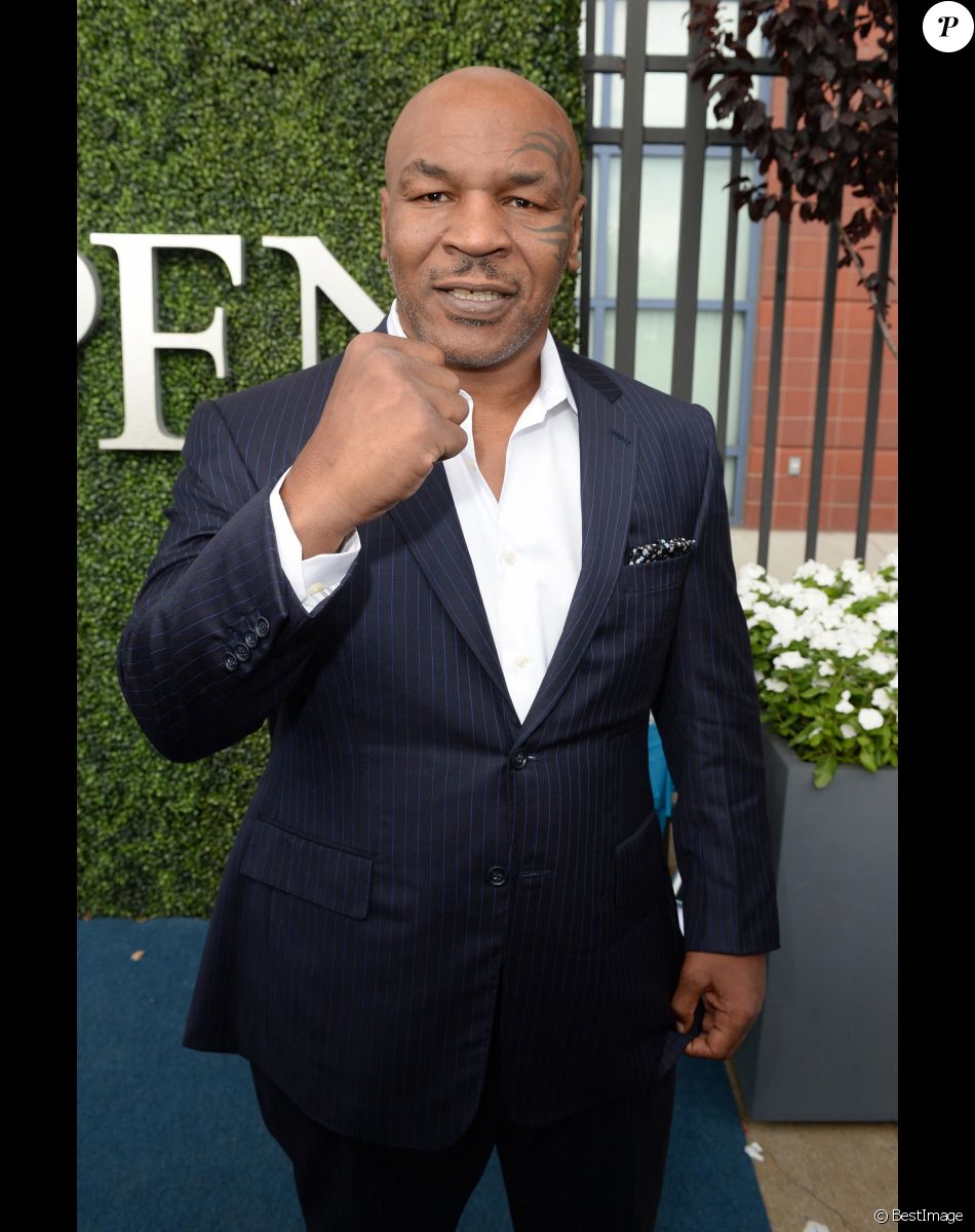 Info - Mike Tyson visé par une nouvelle plainte pour viol - Info - Mike Tyson remonte sur le ring à 54 ans pour un combat exhibition - Mike Tyson lors du tournoi de l'US Open de tennis à Flushing Meadows-Corona Park à New York, le 28 août 2017.