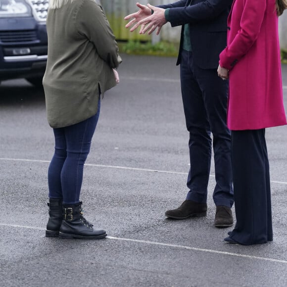 Le prince William de Galles et Kate Catherine Middleton, princesse de Galles, à leur arrivée au Windsor Foodshare à Windsor. Le 26 janvier 2023 