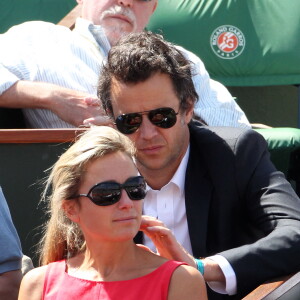Anne-Sophie Lapix et son mari Arthur Sadoun - People dans les tribunes des internationaux de France de Roland Garros à Paris en 2011