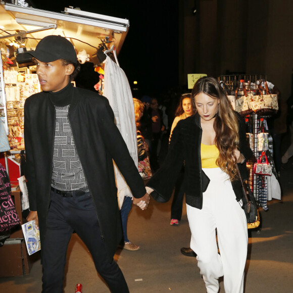 Le chanteur Stromae et sa femme Coralie Barbier - - Défilé de mode "Kenzo" collection prêt-à-porter Printemps-Eté 2017 lors de la Fashion Week de Paris à la Cité de l'architecture et du patrimoine au Trocadéro à Paris, France, le 4 octobre 2016. © Christophe Aubert via Bestimage 