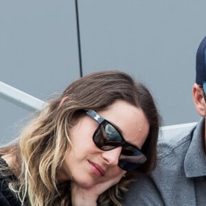 Marion Cotillard et son compagnon Guillaume Canet - People dans les tribunes lors de la finale messieurs des internationaux de France de tennis de Roland Garros 2019 à Paris le 9 juin 2019. © Jacovides-Moreau/Bestimage 