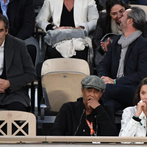 Yannick Noah avec ses enfants Joalukas Noah, Jenaye Noah avec son demi-frère Tomathy Stewart-Whyte (fils de Heather Stewart) - Célébrités dans les tribunes des internationaux de France de Roland Garros à Paris le 30 mai 2022. 