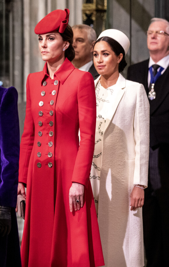 Catherine Kate Middleton, duchesse de Cambridge, Meghan Markle, enceinte, duchesse de Sussex lors de la messe en l'honneur de la journée du Commonwealth à l'abbaye de Westminster à Londres le 11 mars 2019.  11th March 2019 London UK Britain's Queen Elizabeth is joined by Prince Charles, Camilla, Duchess of Cornwall, Prince William and Catherine, Duchess of Cambridge, Prince Harry and Meghan, Duchess of Sussex and Prince Andrew at the Commonwealth Service at Westminster Abbey in London, Monday, March 11, 2019. Commonwealth Day has a special significance this year, as 2019 marks the 70th anniversary of the modern Commonwealth - a global network of 53 countries and almost 2.4 billion people, a third of the world's population, of whom 60 percent are under 30 years old. Also acting is British Prime Minister Theresa May. 