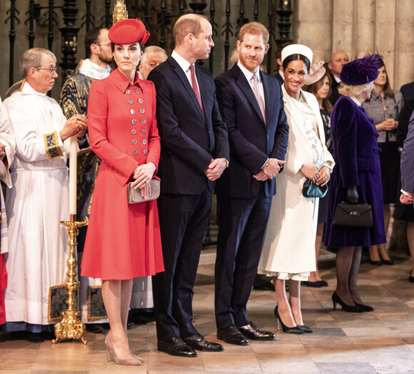 Catherine Kate Middleton, duchesse de Cambridge, le prince William, duc de Cambridge, le prince Harry, duc de Sussex, Meghan Markle, enceinte, duchesse de Sussex, le prince Charles, prince de Galles lors de la messe en l'honneur de la journée du Commonwealth à l'abbaye de Westminster à Londres le 11 mars 2019.  11th March 2019 London UK Britain's Queen Elizabeth is joined by Prince Charles, Camilla, Duchess of Cornwall, Prince William and Catherine, Duchess of Cambridge, Prince Harry and Meghan, Duchess of Sussex and Prince Andrew at the Commonwealth Service at Westminster Abbey in London, Monday, March 11, 2019. Commonwealth Day has a special significance this year, as 2019 marks the 70th anniversary of the modern Commonwealth - a global network of 53 countries and almost 2.4 billion people, a third of the world's population, of whom 60 percent are under 30 years old. Also acting is British Prime Minister Theresa May. 