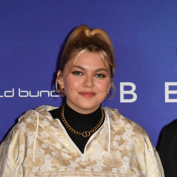 Exclusif - Louane et son compagnon Florian Rossi - Avant Première de " Belle " film animé japonais au Grand Rex à Paris le 6 décembre 2021 . © Veeren / Bestimage