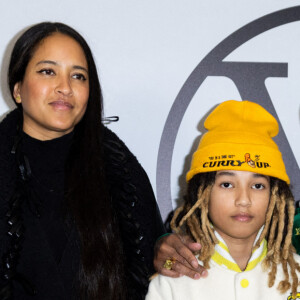 Le nouveau directeur créatif des collections homme de Louis Vuitton, Pharrell Williams, son fils Rocket Ayer Williams (14 ans) et sa femme Helen Lasichanh - Photocall du défilé Louis Vuitton prêt-à-porter automne-hiver 2023/2024 lors de la Fashion Week de Paris (PFW), à Paris, France, le 6 mars 2023. © Olivier Borde/Bestimage 