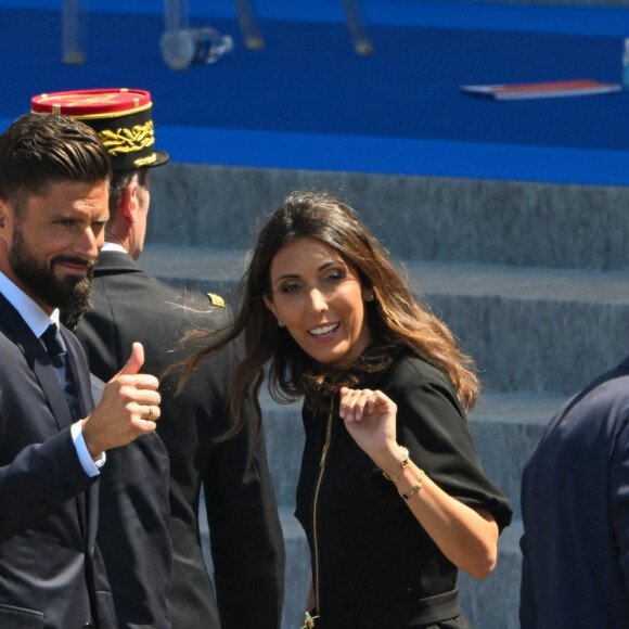 Olivier Giroud et sa femme Jennifer lors du défilé militaire du 14 juillet 2022 place de la Concorde à Paris. © Lionel Urman / Panoramic / Bestimage