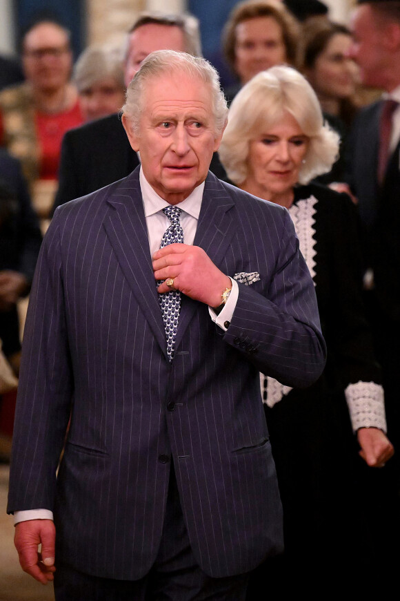 Le roi Charles III d'Angleterre et la reine consort Camilla Parker Bowles lors de la réception pour la journée du Commonwealth au palais de Buckingham à Londres. Le 13 mars 2023 