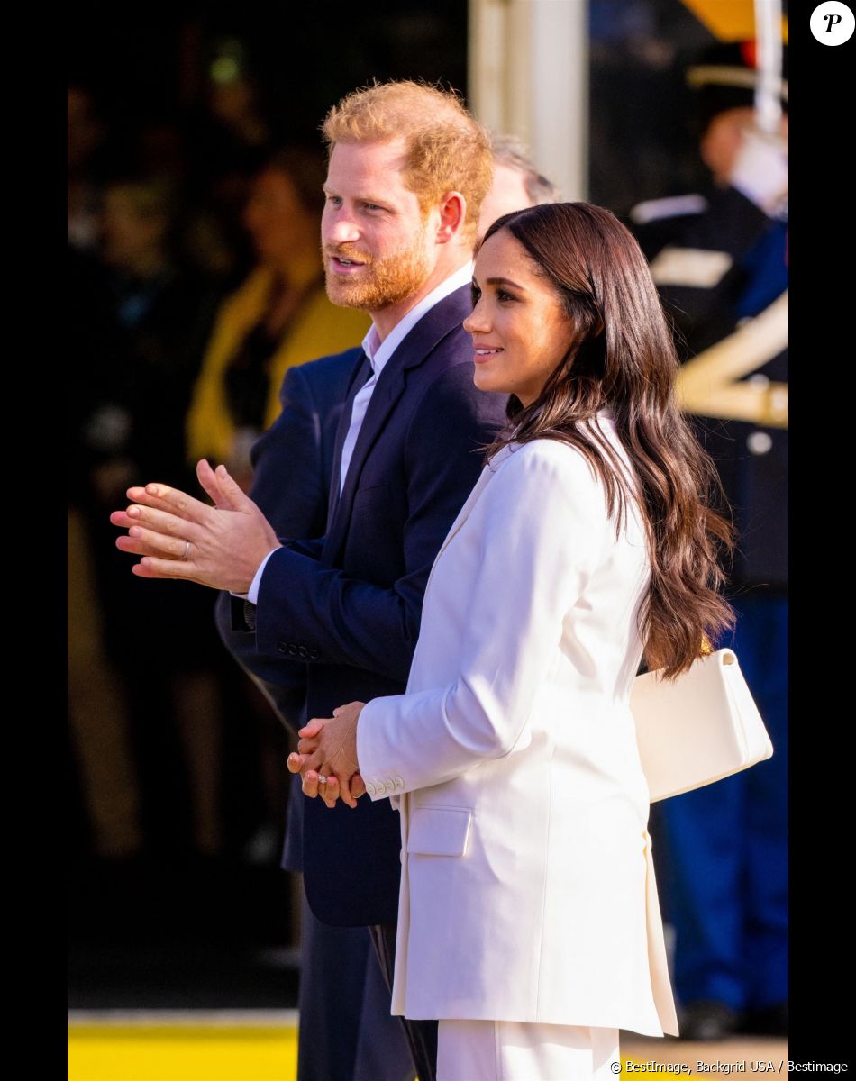 Le tout Hollywod semble vouloir prendre ses distances avec les parents d'Archie, 3 ans et Lilibet, 1 an. Après Elton John, c'est au tour d'Oprah Winfrey de se montrer évasif concernant Meghan et Harry
Le prince Harry et Meghan Markle assistent à une réception organisée par la ville de La Haye et le ministère néerlandais de la Défense, au Nations Home, la veille de l'ouverture des Invictus Games 2020 à Zuiderpark, La Haye, le 15 avril 2022.