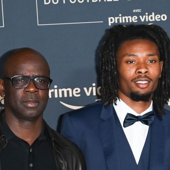 Une vidéo largement reprise sur les réseaux sociaux où les internautes se sont beaucoup amusés de cette vidéo.
Lilian Thuram et son fils Khephren Thuram - Photocall de la cérémonie des Trophées UNFP 2022 au Pavillon Gabriel à Paris le 15 mai 2022. © Coadic Guirec/Bestimage
