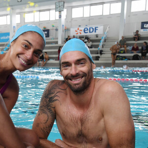 Exclusif - Tatiana Silva et Camille Lacourt participent au Défi de l’Eau au profit de l’Unicef à la Piscine de Vanves le 15 octobre 2022. Tatiana Silva, ambassadrice de l’UNICEF France depuis 2018 et le quintuple champion du monde, Camille Lacourt à la piscine de Vanves à la rencontre d’une centaine d’enfants pour participer à plusieurs activités autour de l’eau dans le but de récolter un maximum de don pour Madagascar. Ce rassemblement sera l’occasion pour nos deux ambassadeurs de nager le premier kilomètre d’un défi collectif digital organisé sur Swimming Heroes, l’application officielle de la FFN. Ce défi verra s’affronter la Team Tatiana et la Team Camille du 15 octobre au 15 novembre dans l’objectif de nager le plus de kilomètres en équipe sur un mois pour débloquer des fonds en faveur des enfants de Madagascar. « Mon métier et mon implication auprès de l’UNICEF m’ont permis de me rendre compte des conséquences du dérèglement climatique et du manque d’accès à l’eau potable des populations vulnérables. Je suis honorée d’être marraine du Défi de l’Eau et d’ainsi poursuivre mon implication dans les programmes WASH que l’UNICEF déploie à Madagascar », explique la nouvelle marraine du Défi de l’Eau, Tatiana Silva. En effet, dans le cadre d’une mission avec l’UNICEF, Tatiana Silva s’était rendue à Madagascar en 2018 pour rencontrer les enfants menacés par le changement climatique. La présentatrice météo poursuit ainsi son engagement pour sensibiliser le public français aux effets liés au changement climatique et à la menace qu’ils représentent pour les enfants vulnérables. De son côté, Camille Lacourt, après s’être rendu en Haïti en 2018 pour témoigner des difficultés rencontrées dans le pays mais aussi des progrès qui ont pu être réalisés grâce au partenariat de la FFN avec l’UNICEF France, sera pour la huitième fois consécutive parrain de cet événement solidaire. © Giancarlo Gorassini / Bestimage