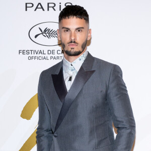 Toutes nos félicitations aux futurs parents !
Baptiste Giabiconi au photocall du dîner "L'Oréal" lors du 75ème Festival International du Film de Cannes, le 18 mai 2022. 