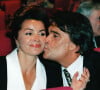 Âgée tout juste de 18 ans et demi, la veuve du "Boss" travaillait pour lui, et n'a pas craqué dès le début
Bernard Tapie et sa femme Dominique en 1996 