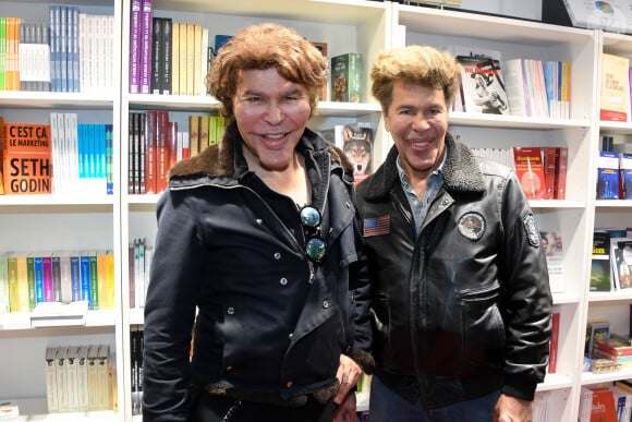 Igor et Grichka Bogdanoff au salon du Livre à la Porte de Versailles de Paris, le 17 mars 2019. © Lionel Urman/Bestimage