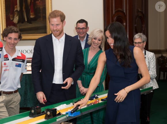 Le prince Harry, duc de Sussex, et Meghan Markle, duchesse de Sussex, participent à la campagne "This Girl Can" à Government House, Melbourne le 18 octobre 2018. 