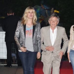 Tous les deux sont mariés depuis 1989. 
Roman Polanski et Emmanuelle Seigner arrivent à la première du film "Blue Jasmine" à Paris le 27 août 2013. © Denis Guignebourg / Bestimage 