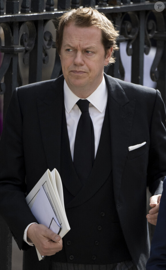 Tom Parker-Bowles, le fils de Camilla, reine consort - Arrivées au service funéraire à l'Abbaye de Westminster pour les funérailles d'Etat de la reine Elizabeth II d'Angleterre. Le sermon est délivré par l'archevêque de Canterbury Justin Welby (chef spirituel de l'Eglise anglicane) au côté du doyen de Westminster David Hoyle. Londres, le 19 septembre 2022. 