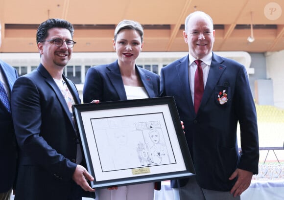 Le prince Albert II de Monaco et la princesse Charlène de Monaco. Remise des prix . - Édition 2023 du Tournoi Sainte Dévote de Rugby au Stade Louis II à Monaco le 22 Avril 2023. ©Claudia Albuquerque / Bestimage 