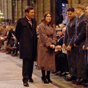 La princesse Eugenie d'York et son mari Jack Brooksbank, arrivent pour le "Together at Christmas" Carol Service à l'abbaye de Westminster à Londres, Royaume uni, le 15 décembre 2022. 