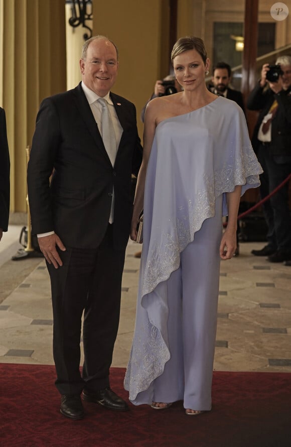 Réception organisée par le roi Charles III, pour les invités étrangers assistant à son couronnement au palais de Buckingham à Londres. Le prince Albert II et la princesse Charlène 