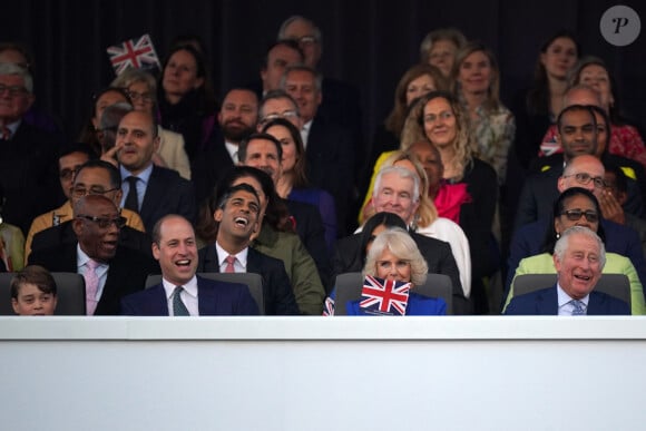 Le prince George de Galles, le prince William, prince de Galles, Camilla Parker Bowles, reine consort d'Angleterree, le roi Charles III d'Angleterre au concert du couronnement du roi et de la reine dans l'enceinte du château de Windsor, Royaume Uni, le 7 mai 2023. 