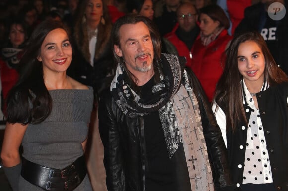 Florent Pagny, sa femme Azucena et leur fille Ael lors de la 15ème cérémonie des NRJ Music Awards à Cannes le 14 décembre 2013.